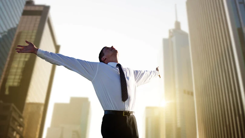 an image of a satisfied man in a city