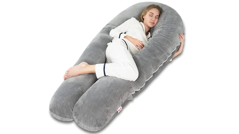 a woman sleeping on a AngQi 65 inch Pregnancy pillow