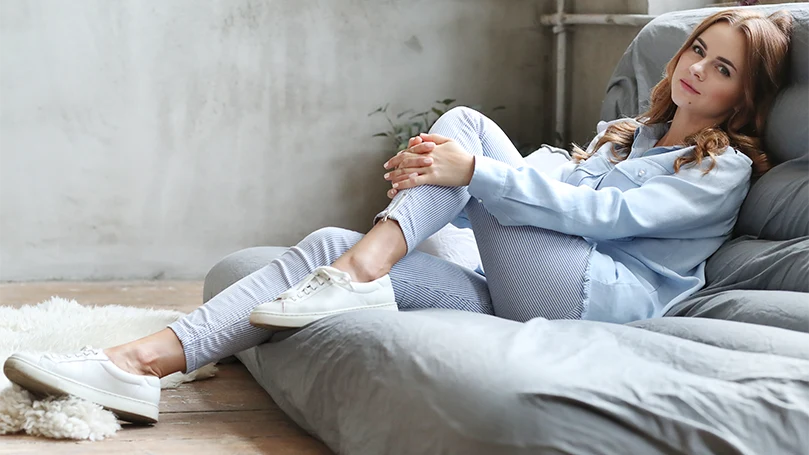 an image of a woman sitting on an air mattress