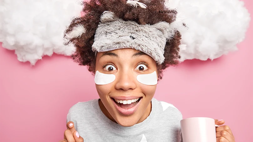 An image of a woman preparing for a coffee nap.