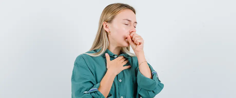 Woman coughing