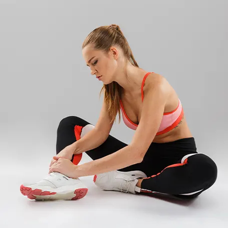 An image of a woman stretching.