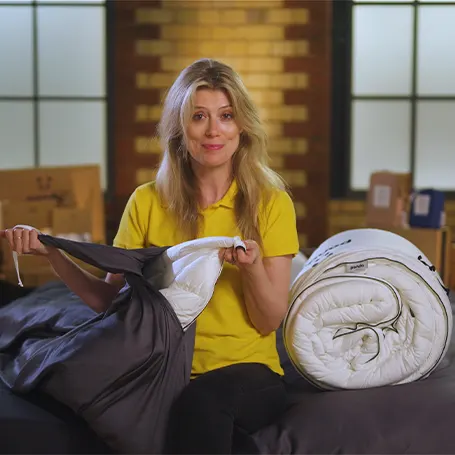 our presenter Charlotte holding Panda Cloud duvet